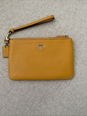 Coach Mustard Pebbled Leather Wristlet with Gold Hardware